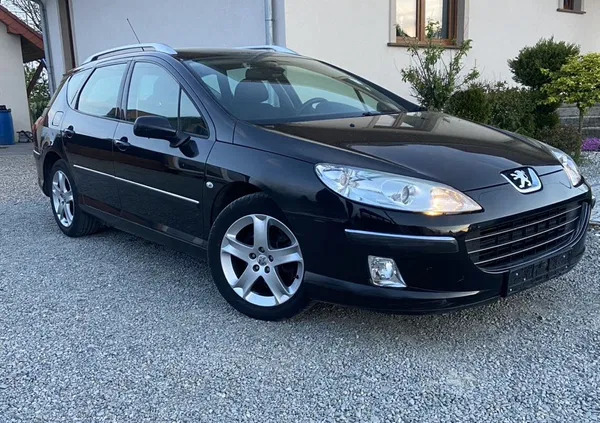 samochody osobowe Peugeot 407 cena 12900 przebieg: 169400, rok produkcji 2009 z Ślesin